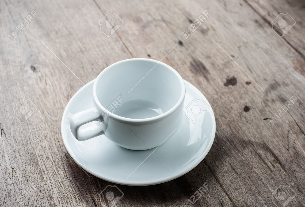 empty cup of coffee on wood background